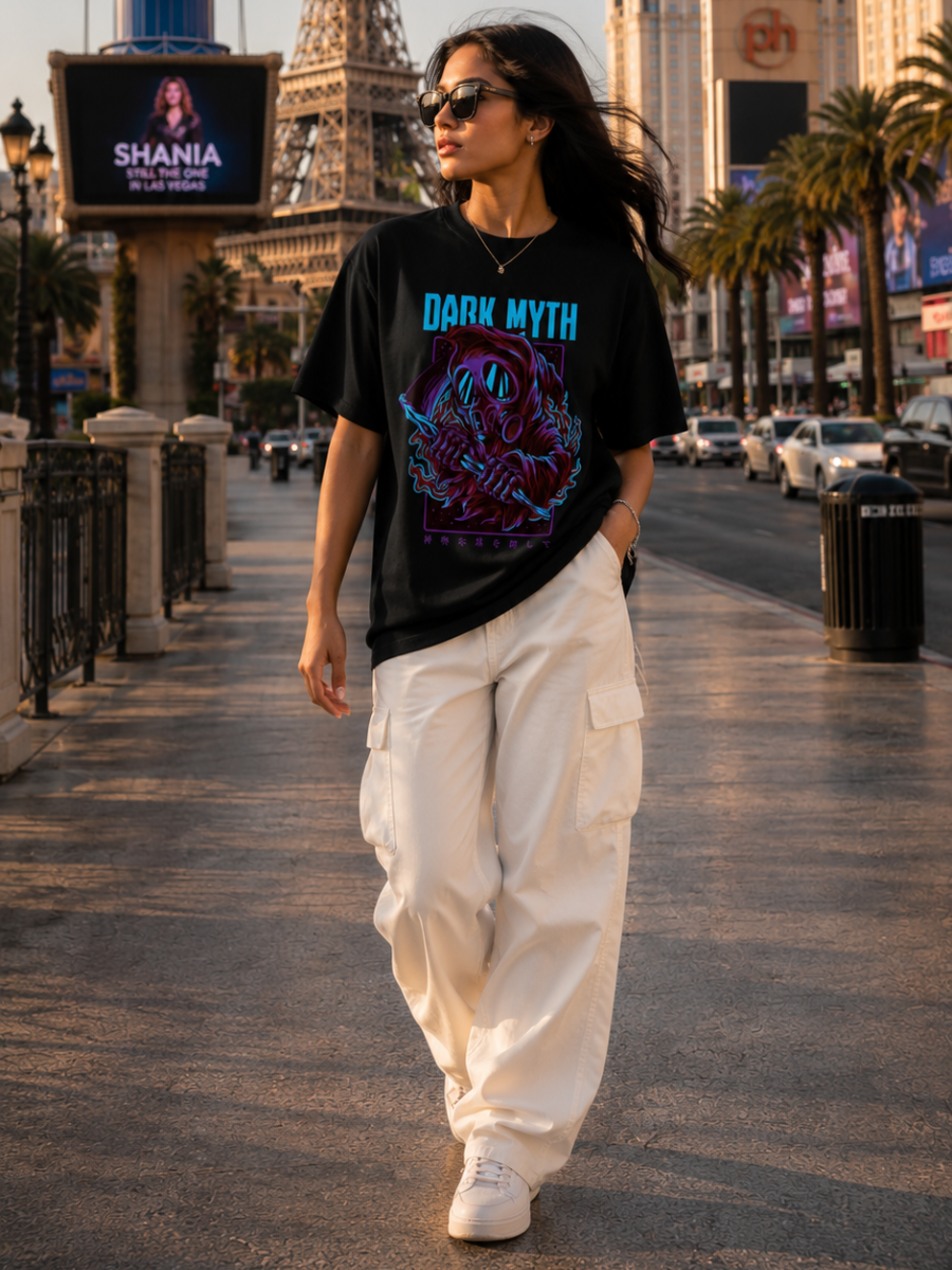 Female model wearing Zingleberry Dark Myth Premium Unisex Black Cotton Graphic T-Shirt styled with white cargo pants for casual summer street fashion