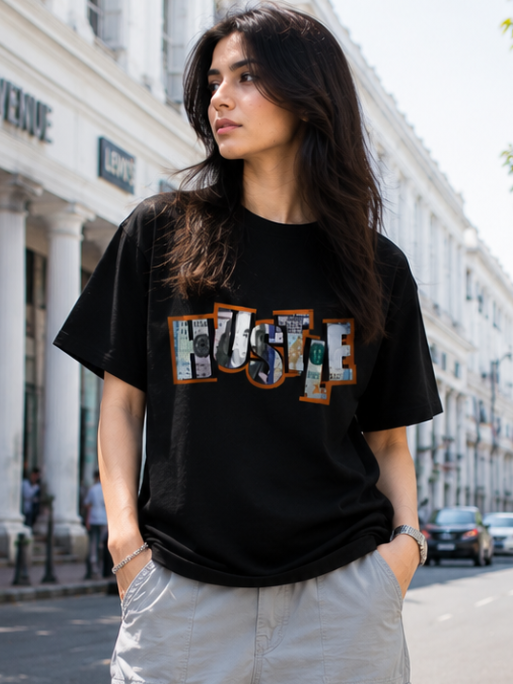 Female model wearing Zingleberry Hustle Premium Unisex Black Cotton Graphic T-Shirt styled with light grey cargo pants for a fashionable summer streetwear outfit.