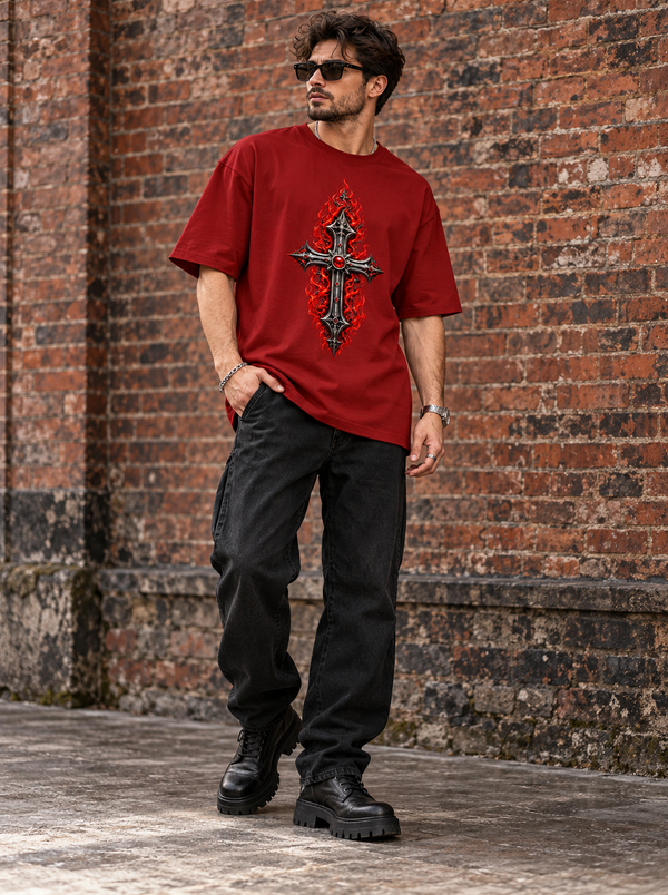 Male model wearing Zingleberry Inferno Cross red oversized Gothic T-shirt with black relaxed jeans and combat boots.