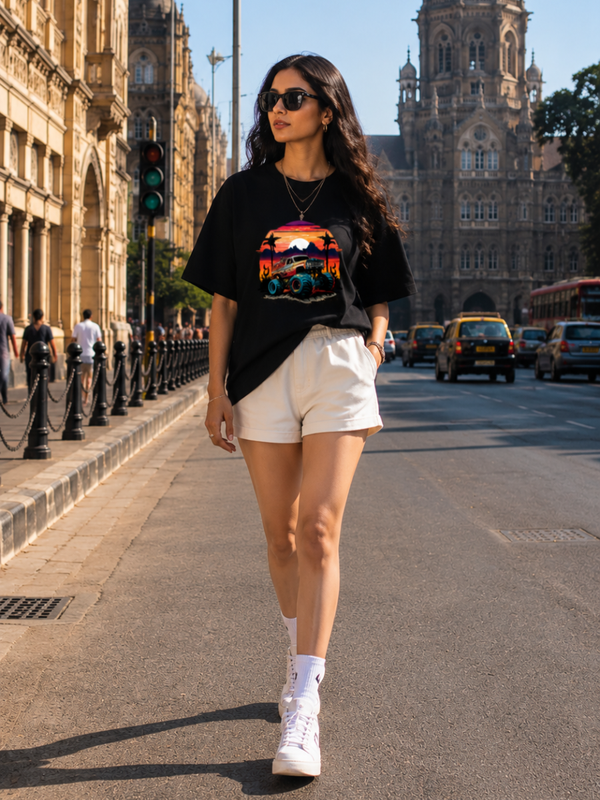 Female model wearing Zingleberry Premium Unisex Classic Crew Off-Road Sunset black graphic T-shirt paired with white shorts in a modern city street fashion photoshoot.