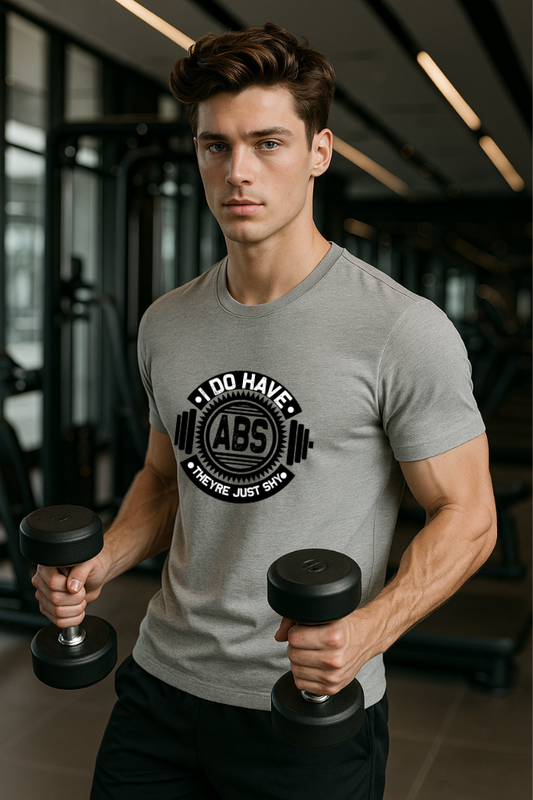 Man in grey Zingleberry round neck gym t-shirt with "I Do Have Abs" print, perfect for fitness lovers and active lifestyles.