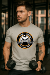 Man in grey Zingleberry gym t-shirt with motivational “When Others Quit I Keep Going” print, ideal for fitness and gym workouts.