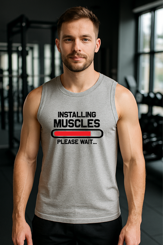 Man wearing grey sleeveless Zingleberry gym t-shirt with “Installing Muscles” print, ideal for gym lovers and fitness training.