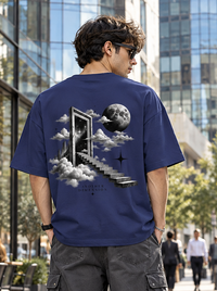Male model showing back artwork of Zingleberry Another Dimension navy blue oversized T-shirt