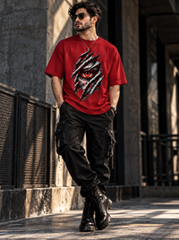 Male model wearing Zingleberry Crimson Gaze red oversized Gothic T-shirt with black cargo pants and black boots.