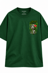 Zingleberry Grow Through It bottle green unisex oversized T-shirt with small botanical sculpture left-chest print.