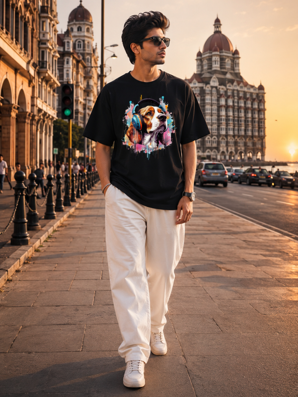 Male model wearing Zingleberry Premium Unisex Classic Crew Music Dog black graphic T-shirt paired with white trousers in a modern urban fashion photoshoot.