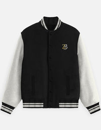 Front view of the Zingleberry premium unisex varsity jacket in black with off-white sleeves, featuring a classic button-down front and the gold ZB chest logo.