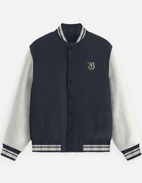A front-facing flat lay of the Zingleberry premium unisex varsity jacket in navy blue with off-white sleeves, featuring a classic snap-button front and ZB chest embroidery.