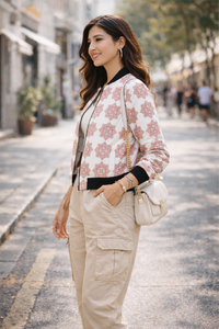 Side view of Zingleberry premium women’s AOP bomber jacket featuring geometric floral tile print and ribbed cuffs